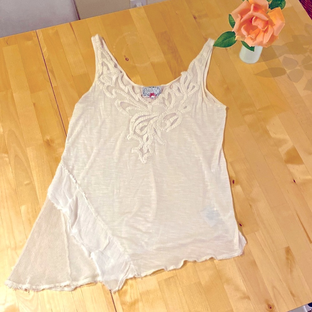 Baraschi XS creme colored textured and netted asymmetrical camisole
